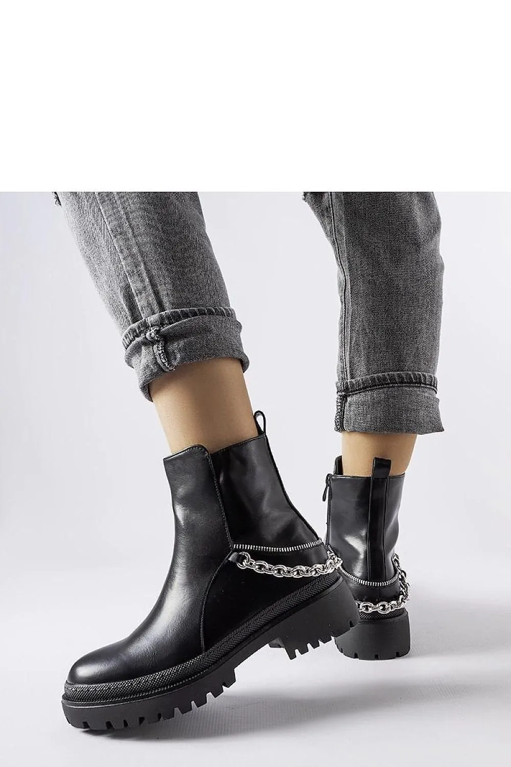 Brown ankle boots with a chain