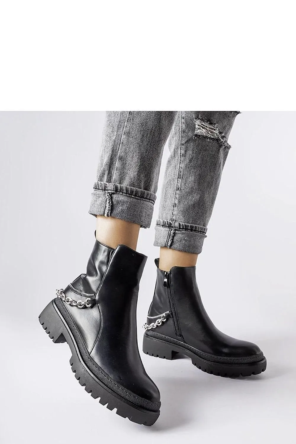 Brown ankle boots with a chain