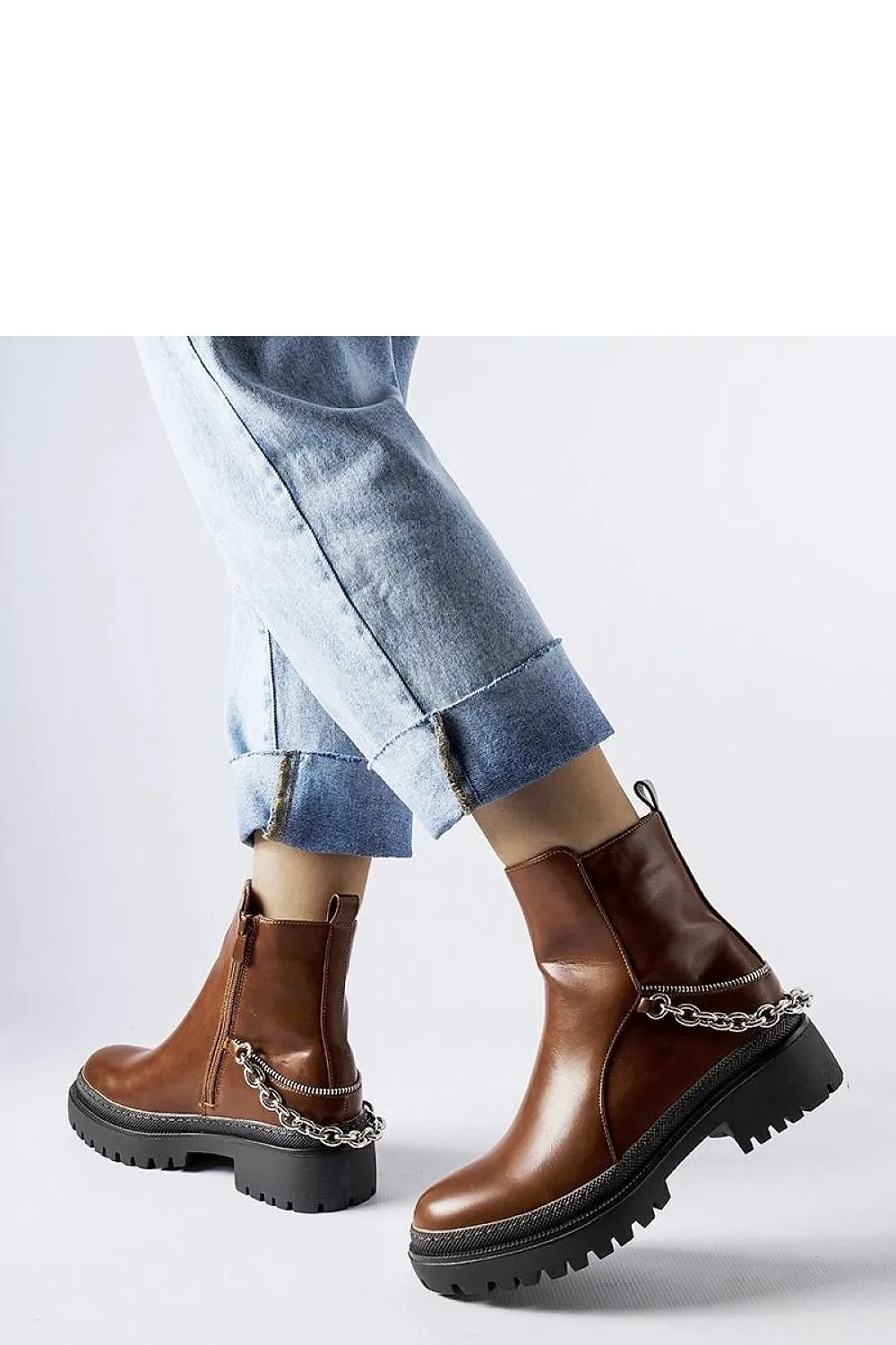 Brown ankle boots with a chain