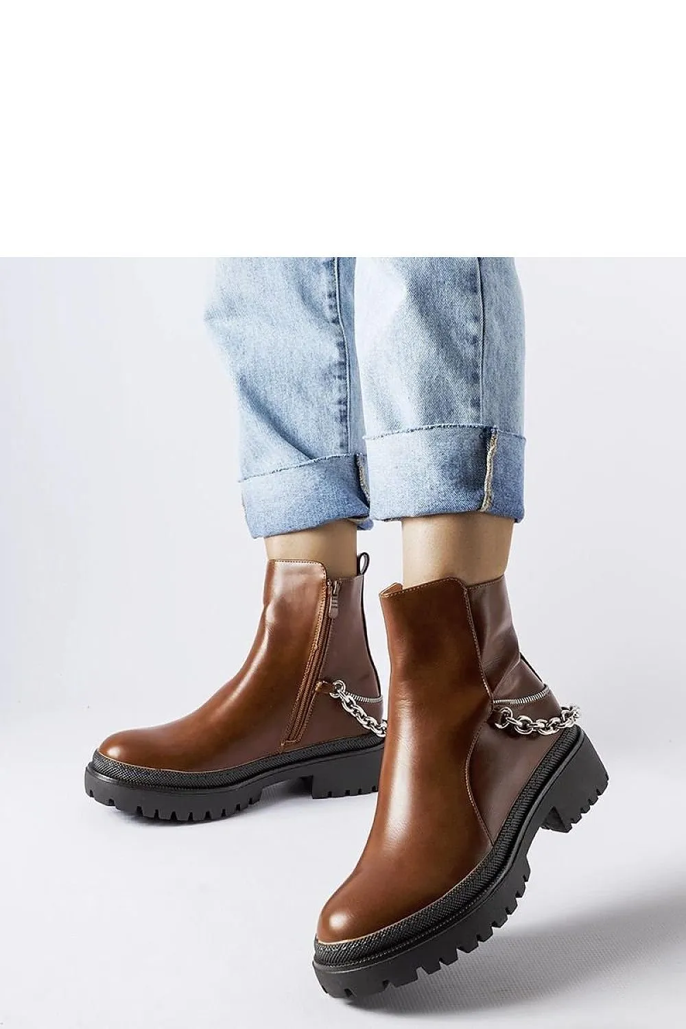 Brown ankle boots with a chain